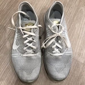 Nike white and gold sneakers